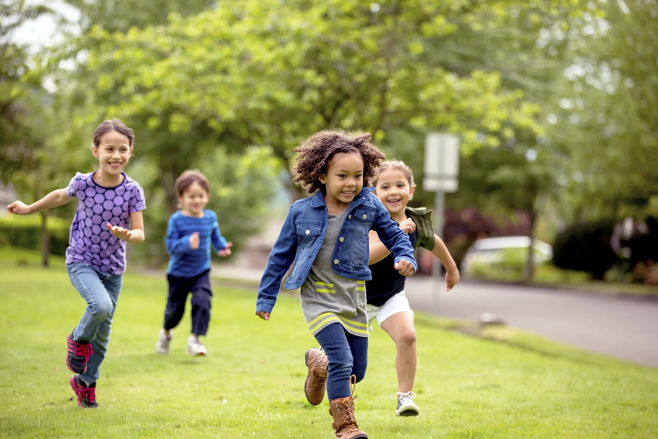 group of kids running and playing