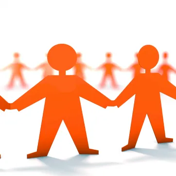 cutouts of people holding hands